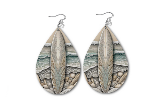 ORNAMENTAL WAVE RIDER WATERDROP EARRINGS